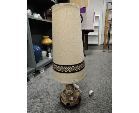 A mid century table lamp possibly West German pottery having under and over light with original shade