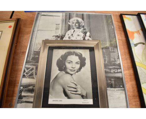A photographic print of Marilyn Monroe and Jennifer Jones