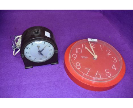 Two clocks including bakelite Smiths alarm clock and Westclox red cased