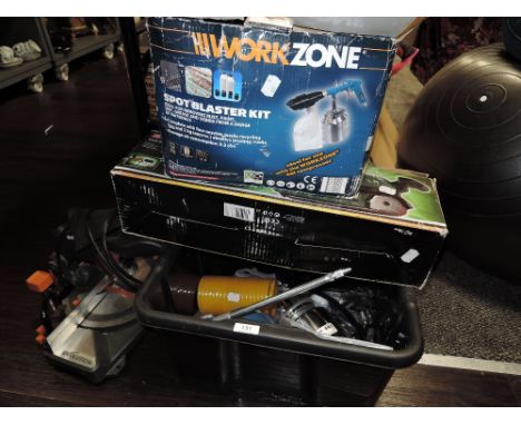 a collection of power tools including belt sander also spray paint guns and more.