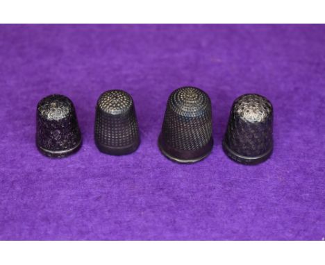 Four HM silver thimbles of various designs