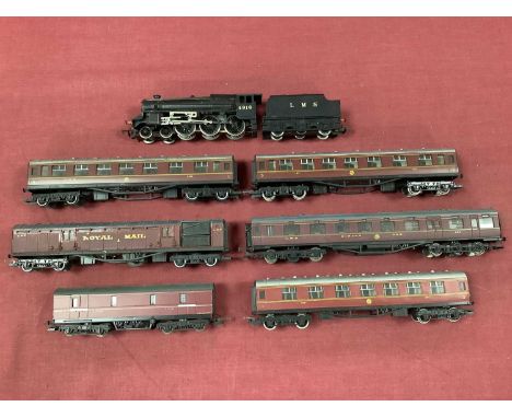 An 00 gauge LMS express train consisting of Hornby Black Five locomotive (untested) and six coaches including a twelve-wheel 
