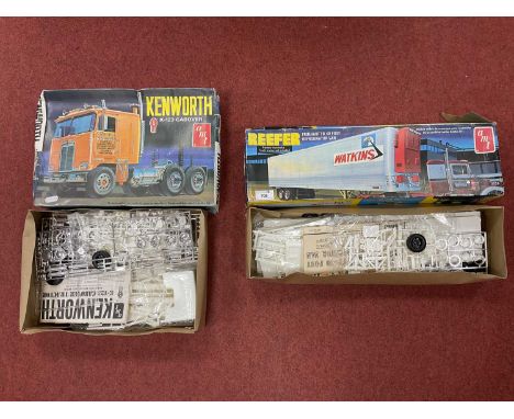 Two AMT 1:25 Scale Plastic Model Kits comprising of #T520 Kenworth K-123 Cabover Tractor, #T507 Reefer Fruehauf FB 40 Foot Re