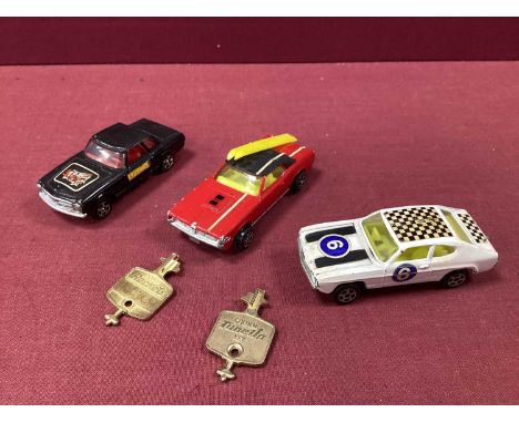Three Original James Bond OHMSS Corgi Rockets, black Mercedes 280/Ford Capri and Mercury Cougar (missing one set of skis), pl