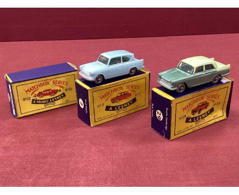 Two Lesney Matchbox 1-75 No 29 Austin Cambridge, two tone green, plastic wheels, good, boxed, crushing to box and inner flap 
