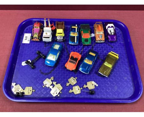 Eleven Original Corgi 'Rockets', including Holmes Wrecker, Jaguar control car (missing crew), Mercury Couger, plus spare chas