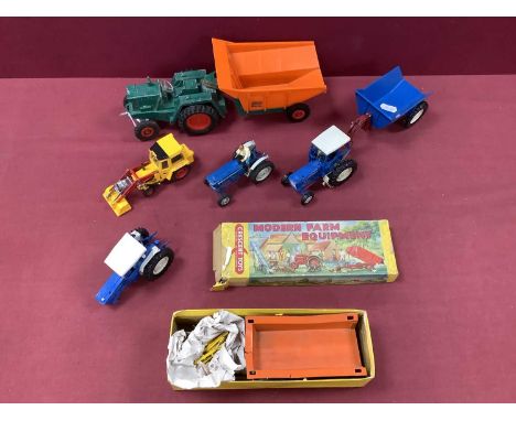 A Die-Cast Hay Wagon by Crescent, badly fatigued, missing horses, boxed/ a Triang tractor and trailer and three Britain's Rap