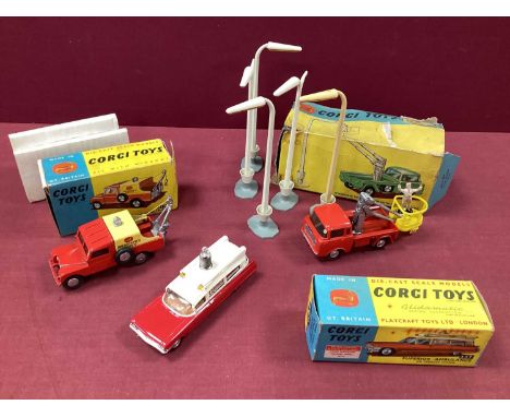 Three Original Corgi Toys No 437 Superior Ambulance with flashing light, overall paint very good, however missing bulb and ba