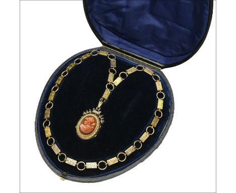 A 19th century gold mounted hardstone cameo locket pendant, carved to depict Ares, Greek god of War, within ropetwist and bea
