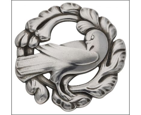 Georg Jensen: a Danish silver circular dove brooch designed by Kristian Møhl-Hansen, No. 70, the standing dove within a folia