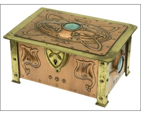 An Art Nouveau McVitie & Price copper and brass biscuit casket, 1904, the panels embossed with whiplash designs,  inset with 