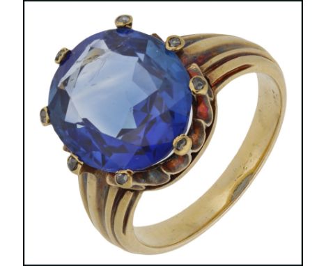 A late 19th century Burmese sapphire ring, set with an oval-shaped sapphire weighing approximately 6.20 carats, each claw inl