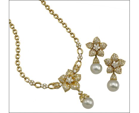 A cultured pearl and diamond necklace and earring suite by Kutchinsky, the fancy-link chain leading to a frontispiece set wit