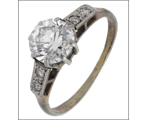 A diamond ring, the brilliant-cut diamond centred between single-cut diamond set shoulders, principle diamond weight approxim