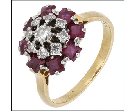 A  ruby and diamond cluster ring, circa 1970, the raised brilliant-cut diamond cluster within a surround of square-cut rubies