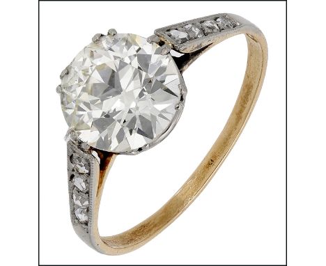 An early 20th century diamond ring, set with a transitional-cut diamond, weighing 2.53 carats, between shoulders set with ros