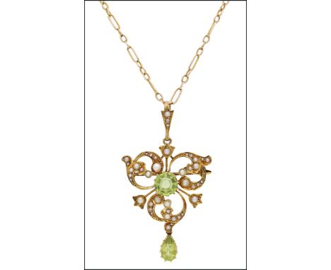 A late Victorian/Edwardian gold mounted peridot and seed pearl pendant/brooch, of openwork scrolling design, centred with a h