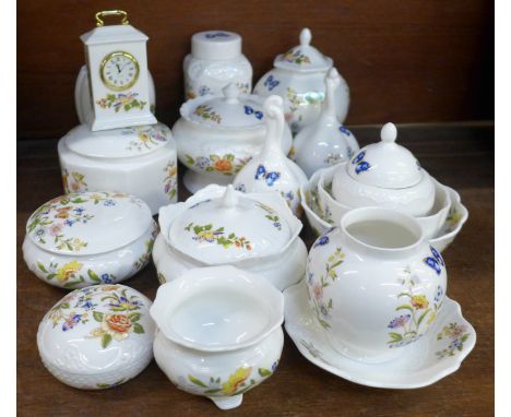 A collection of Aynsley Cottage Garden lidded pots, bells, clock and bowls, seventeen in total 