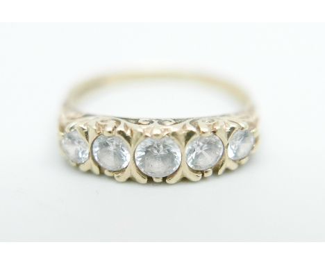 A 9ct gold ring set with white stones, 2.6g, P 