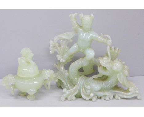 A carved jade relief of Boy with Dragon, 15.5cm tall and a carved jade incense burner with hoop handles in centre, both with 