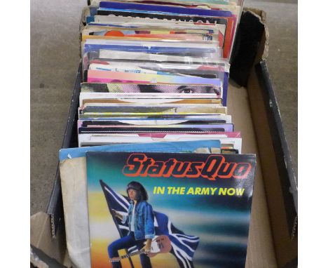 A collection of over 100 7" 45rpm singles including The Beatles, Rolling Stones, Status Quo, some 1980's, etc. 