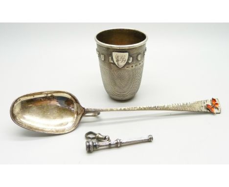 A novelty Victorian silver 'Just a Thimble Full' shot cup with applied shield with initials, Birmingham 1876, Hilliard &amp; 