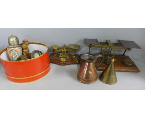 A collection of brass and a novelty couple kissing wine stopper, two sets of postage scales and weights, plated ware, etc. 