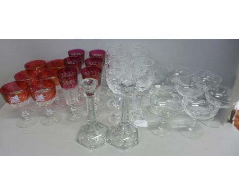 A box of mixed drinking glasses, eight various etched champagne coups, two sets of six ruby flash glasses, a a pair of glass 