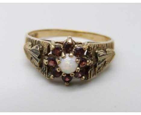 A 9ct gold, opal and garnet cluster ring, 3.3g, R 