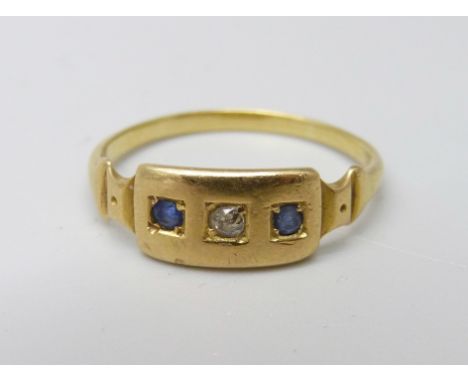 A yellow metal diamond and sapphire ring, 2.5g, M/N 