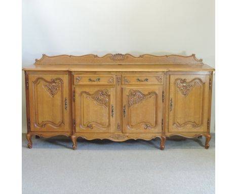 A French light oak sideboard, with a parquetry top, 220cm