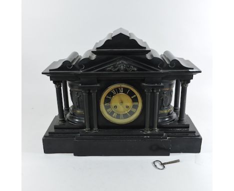 An early 20th century black slate mantel clock, 38cm tall