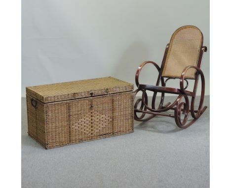 A cane seated bentwood rocking chair, together with a large wicker trunk, 90cm
