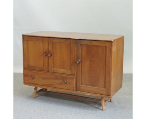An Ercol elm sideboard, 114cm