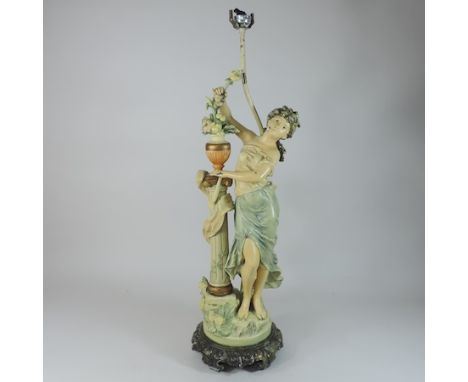 A painted metal figural table lamp, 74cm tall overall