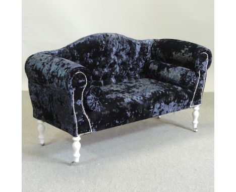 A crushed velvet black sofa