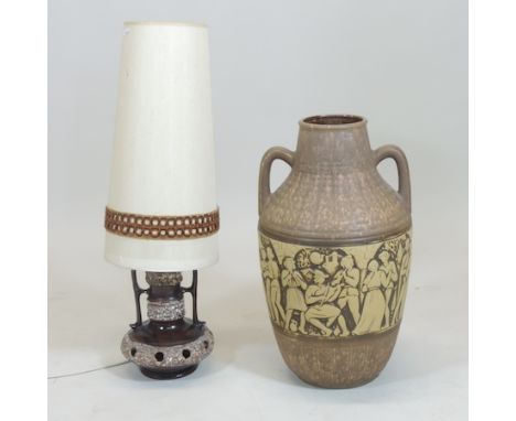 A 1970's brown glazed pottery table lamp and shade, 78cm tall, together with a twin handled vase