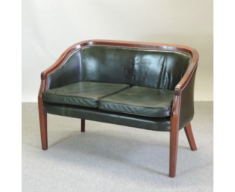 A green leather upholstered show frame two seater sofa, on square legs, 110cm 