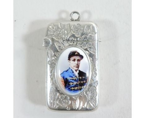 A silver and enamel vesta of a jockey, 4cm