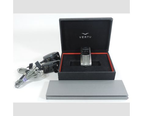 A Vertu Ascent tan leather and metal cased mobile phone, boxed, with manual