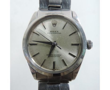 A Rolex Oyster Perpetual gentleman's steel cased chronometer wristwatch, the silvered dial with baton hours, on a flexible st