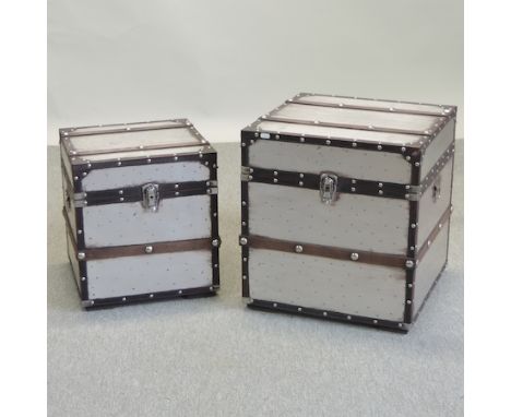 An aluminium trunk, 49cm, together with another smaller