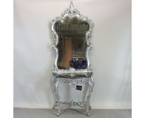 A French style silvered serpentine marble top console table, 90cm together with a matching pier mirror