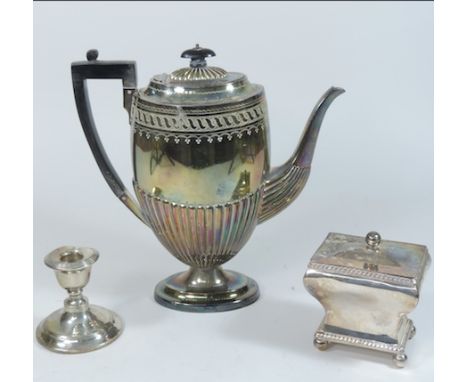 A silver plated teapot, together with a Sheffield plated tea caddy and a silver candlestick, 8cm tall