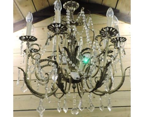 A gilt metal and crystal eight branch chandelier, 60cm diameter