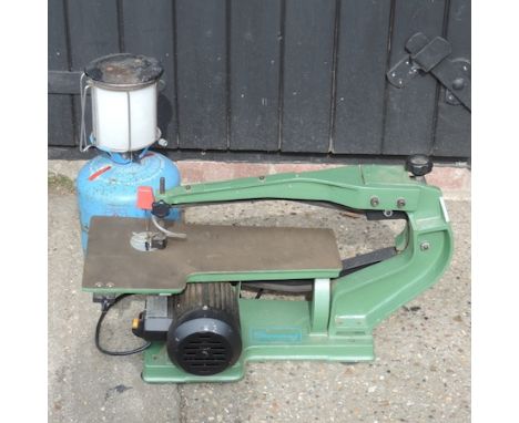 A Sherwood fretsaw, together with a gas lamp