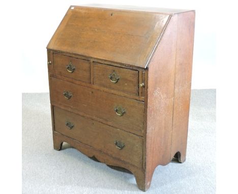 An 18th century oak bureau, on bracket feet, 87cm