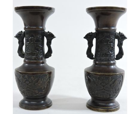 A pair of Chinese bronze twin handled vases, 15cm tall 