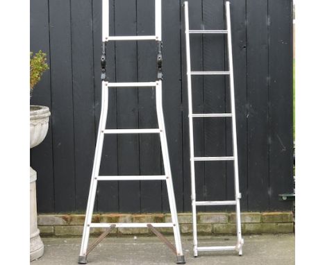 An aluminium loft ladder, 148cm, together with another