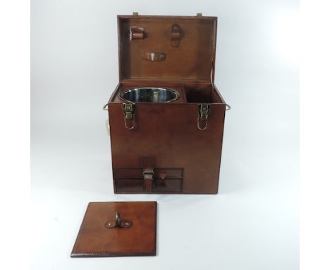 A leather champagne hamper, 36cm tall